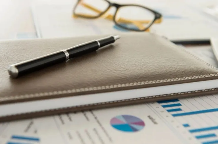 Picture of services offered by chartered accountants such as bookkeeping services & tax services.